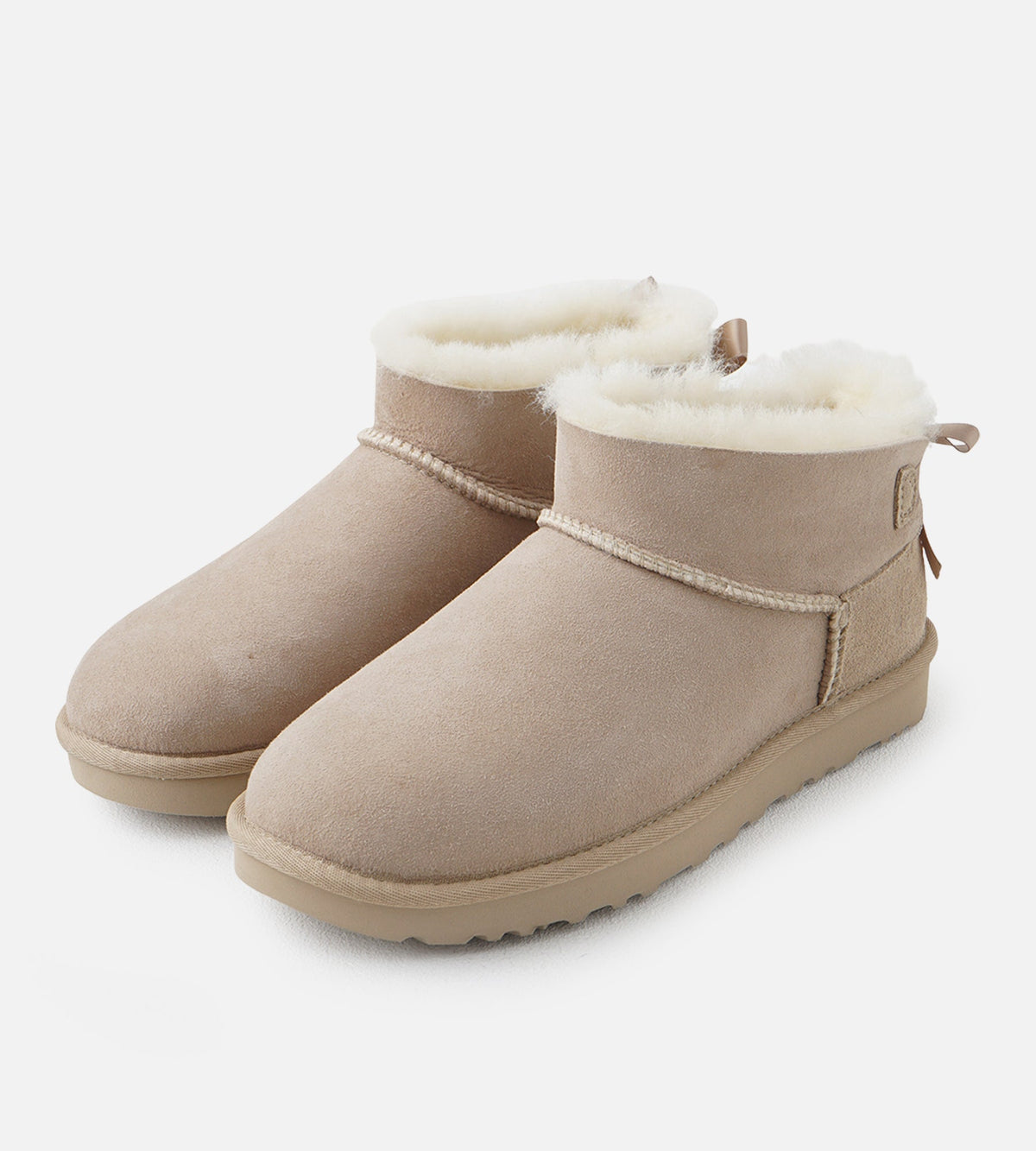 UGG W Ultra Mini Bailey Bow Sand